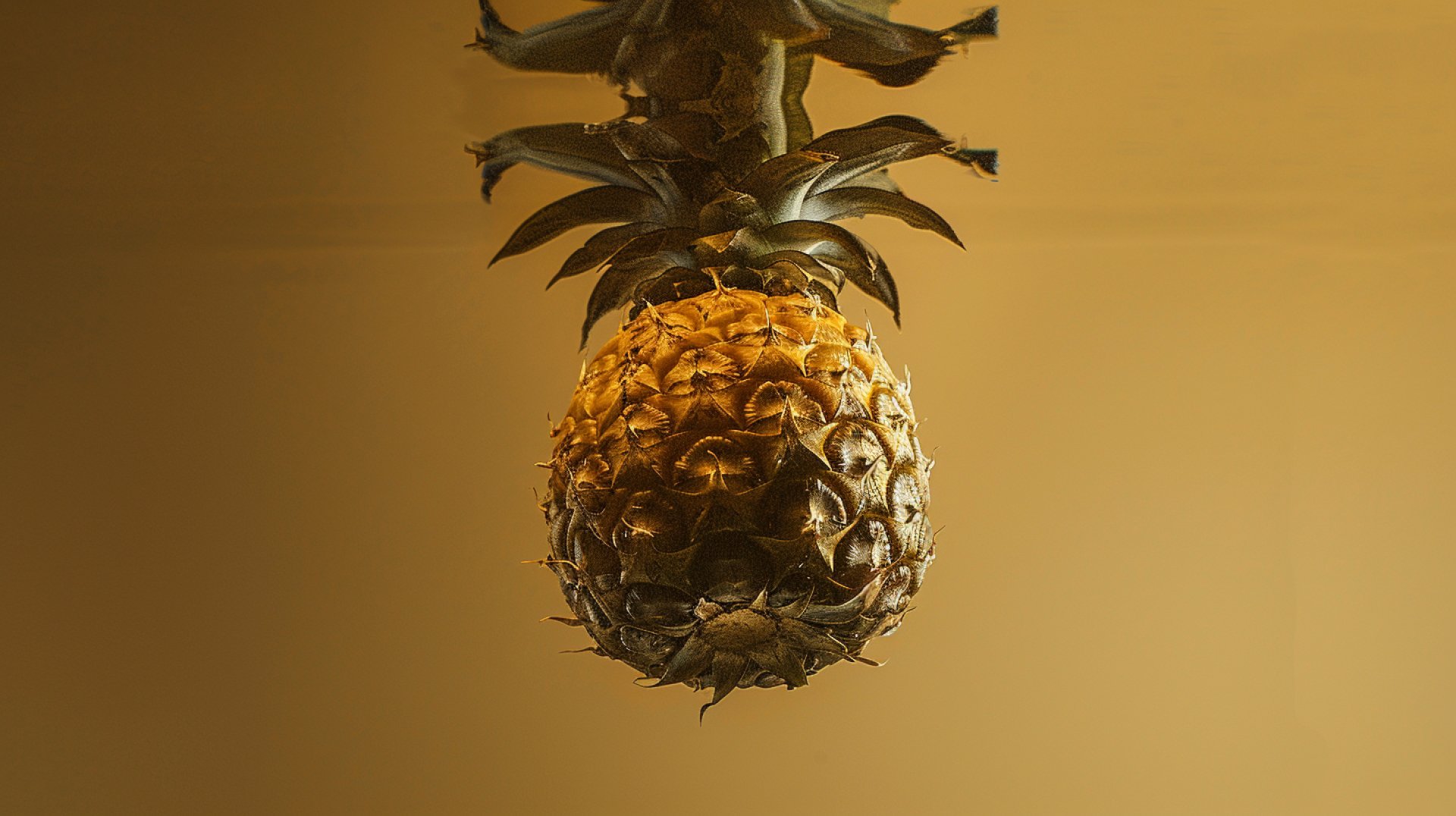 Stylish 16:9 Wallpaper Featuring Upside Down Pineapples